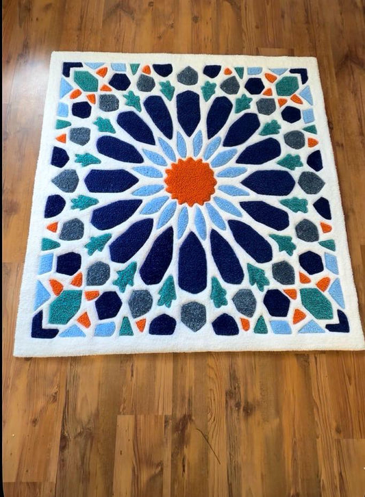 Hand-tufted Moroccan mosaic rug in navy, blue, teal and orange on ivory, full view