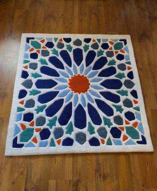 Close view of hand-tufted Moroccan mosaic rug showing carved texture