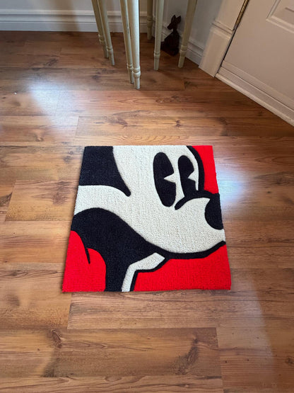 Pop-art Mickey rug styled on a wood floor by a doorway