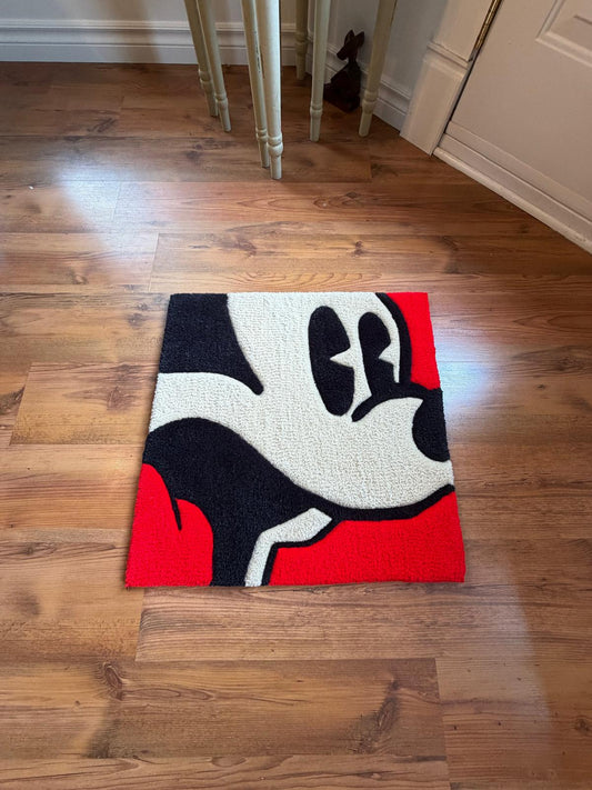 Pop-art Mickey rug styled on a wood floor by a doorway